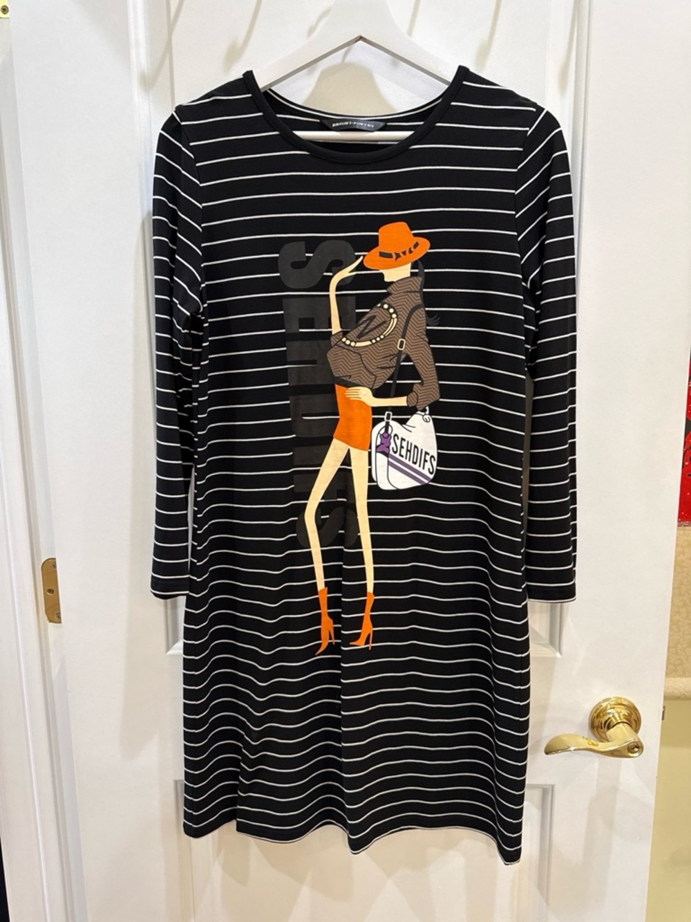 Black and White Striped Long-Sleeve Dress with Orange Graphic